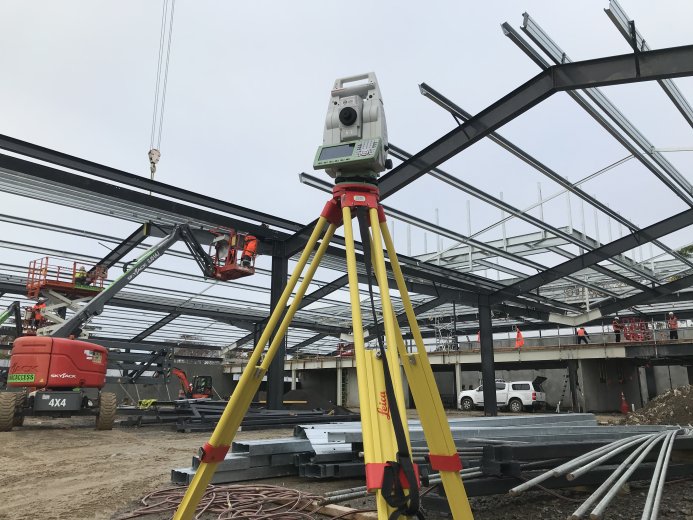 Survey equipment with roof structure in background