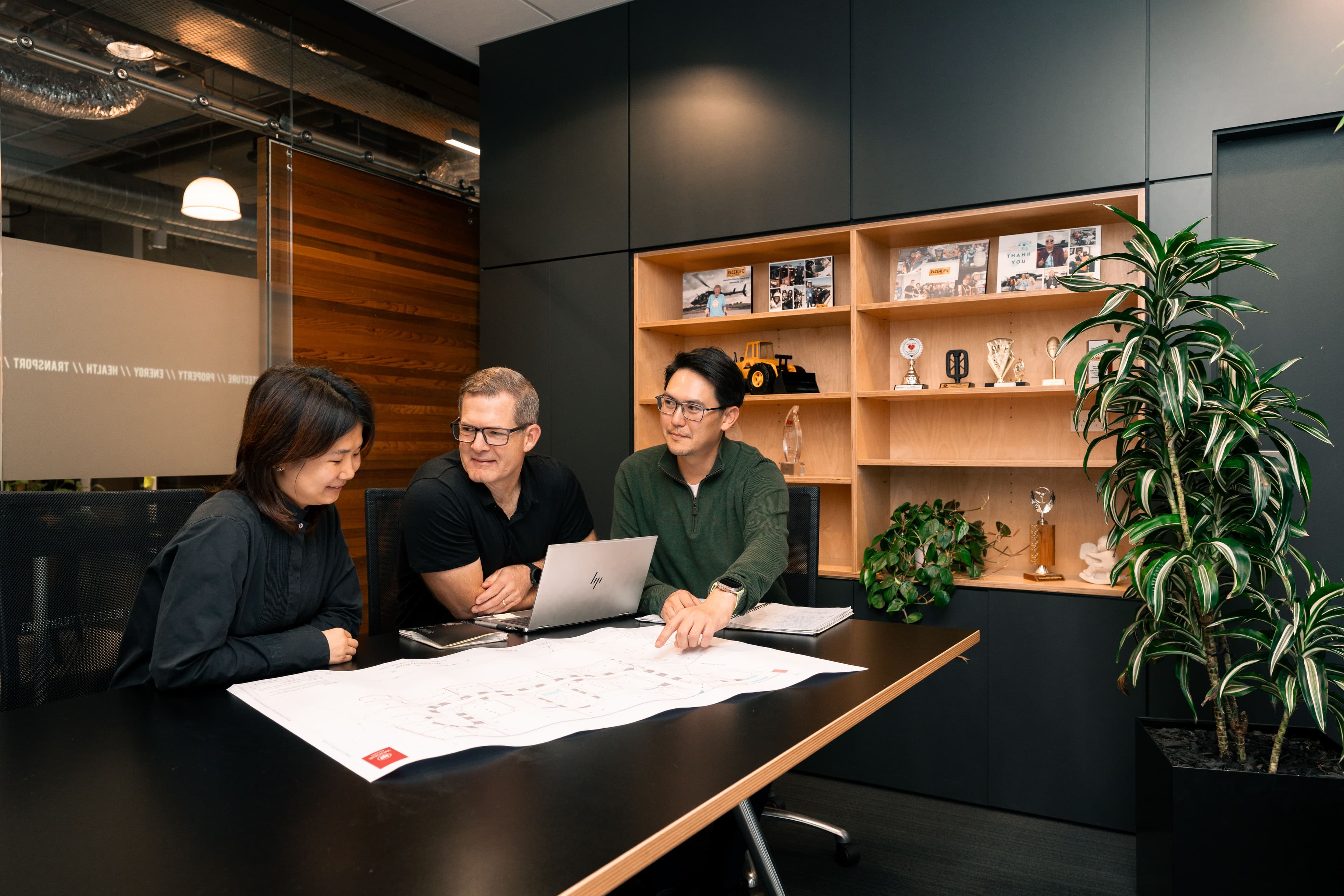 Woods team sitting around a table