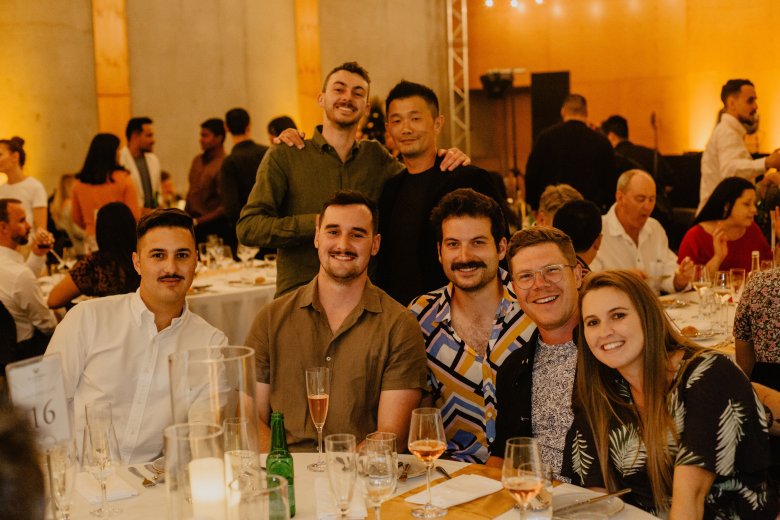 Group of Woods staff at a company social function