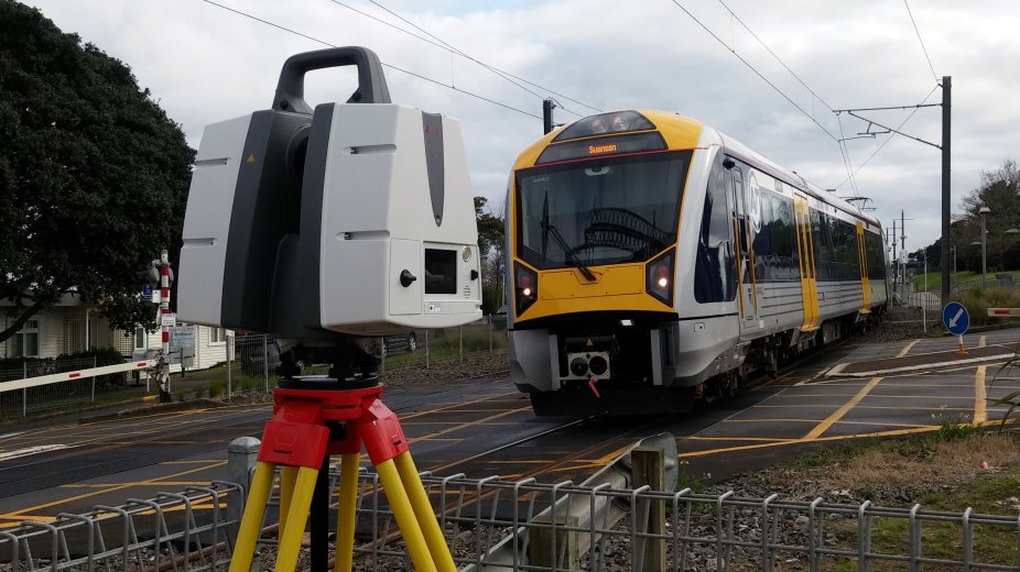 3D laser scanning equipment with train in background