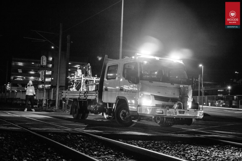 Mobile laser scanning truck at railway at night