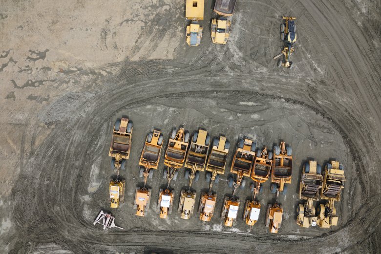 Aerial view of machinery parked in subdivision
