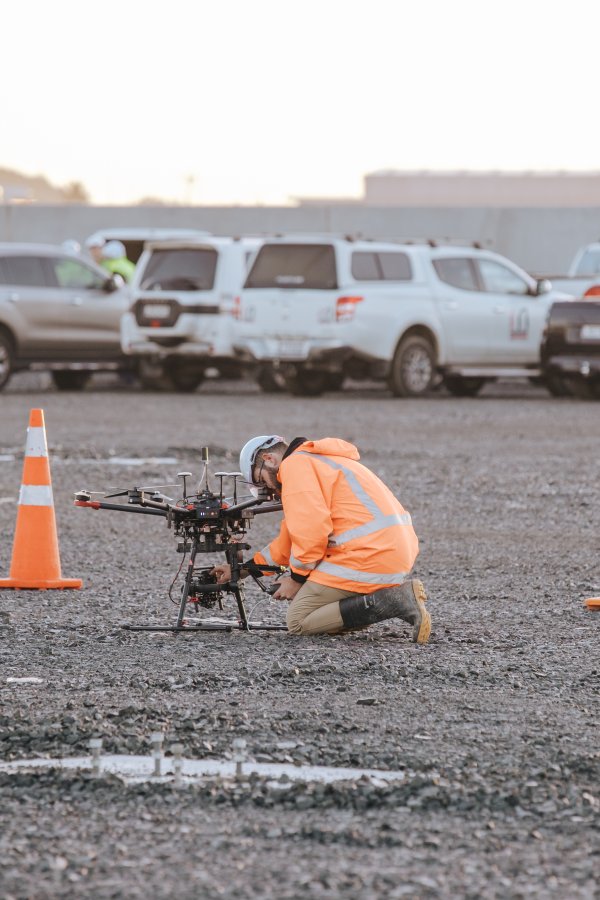 Drone with operator preparing for flight